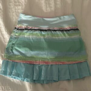 Ivivva tennis skirt with built in shorts. Still in good condition!